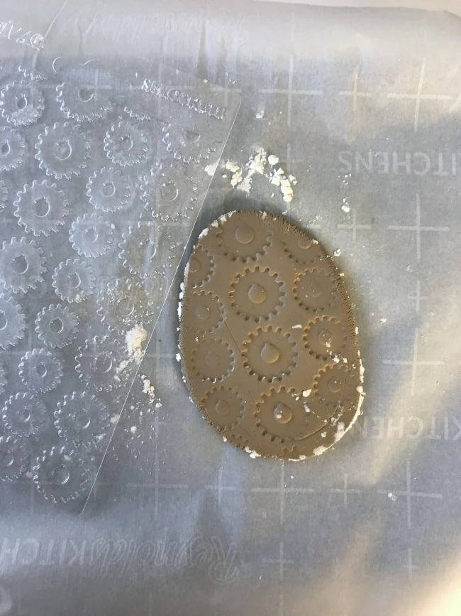 Remove the Designer Texture Sheet from the clay to reveal the pattern.